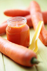 Homemade baby food with carrots.